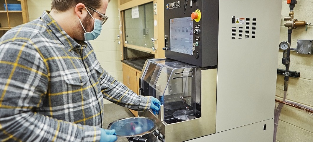 Student Lab Assistant, Davis, using the Dicing Saw