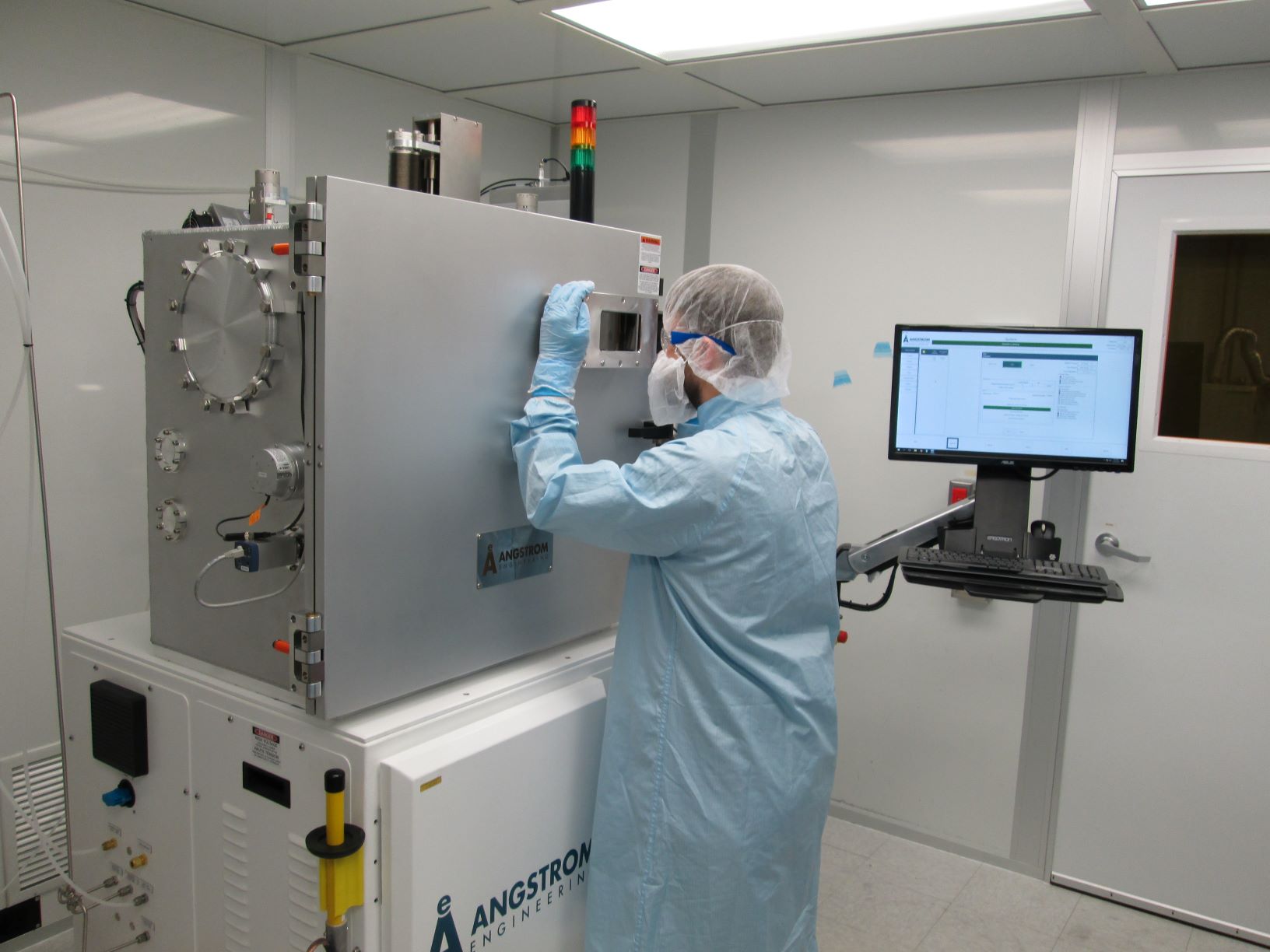 A user operating the EvoVac evaporator